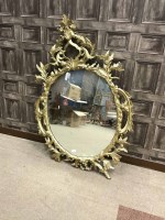 Lot 1364 - 20TH CENTURY OVAL OVERMANTEL MIRROR IN THE...
