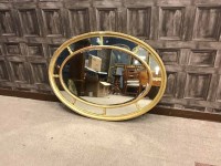 Lot 1371 - GILT GESSO OVAL WALL MIRROR with mirrored...