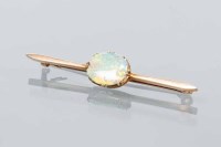 Lot 1772 - OPAL BAR BROOCH set with an oval shaped opal,...