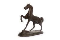 Lot 1415 - BRONZED SPELTER SCULPTURE OF A HORSE modelled...