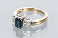 Lot 1774 - SAPPHIRE AND DIAMOND RING the emerald cut...