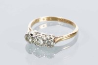 Lot 1776 - DIAMOND THREE STONE RING set with three...