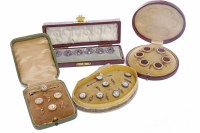 Lot 1465 - FOUR CASED SETS OF BUTTONS comprising three...