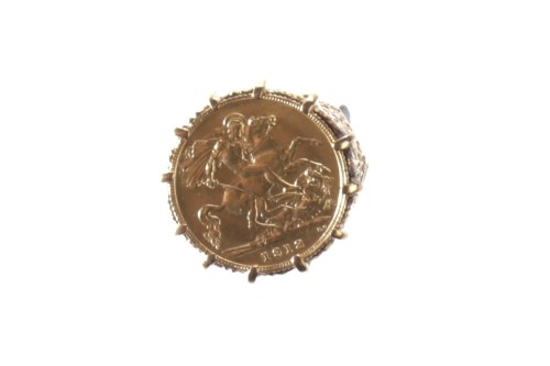 Lot 511 - GOLD HALF SOVEREIGN DATED 1913 mounted in a...