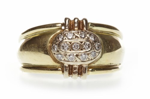 Lot 31 - DIAMOND DRESS RING the broad tapered band with...