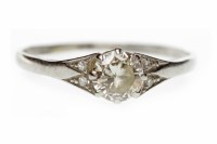 Lot 69 - PLATINUM DIAMOND SOLITAIRE RING with a round...