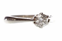 Lot 188 - PLATINUM DIAMOND SOLITAIRE RING with a six...