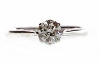 Lot 291 - DIAMOND SOLITAIRE RING set with a round...