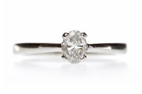 Lot 358 - PLATINUM DIAMOND SOLITAIRE RING set with an...