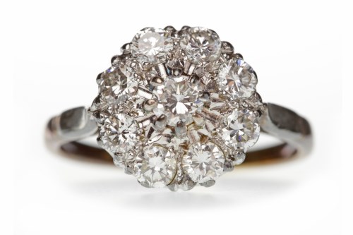 Lot 384 - DIAMOND FLOWER CLUSTER RING set with round...