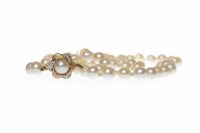Lot 436 - SINGLE STRAND PEARL NECKLACE formed by...