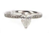 Lot 541 - PLATINUM DIAMOND SOLITAIRE RING set with a...
