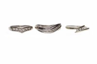 Lot 559 - THREE NINE CARAT GOLD RINGS each in white gold...