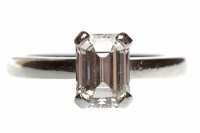 Lot 581 - PLATINUM DIAMOND SOLITAIRE RING set with an...