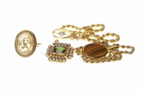 Lot 644 - NINE CARAT GOLD ROPETWIST NECKLACE with tigers...