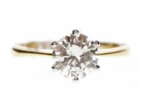 Lot 717 - DIAMOND SOLITAIRE RING with a six claw set...