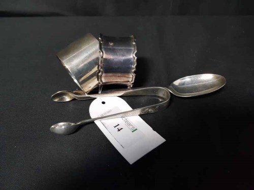 Lot 14 - TWO SILVER NAPKIN RINGS also a silver teaspoon,...