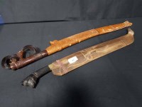 Lot 92 - SARAWAK SWORD with carved wooded handle and...