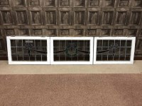 Lot 256 - SET OF THREE LEADED GLASS WINDOWS the centre...