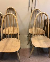 Lot 452 - ERCOL STYLE DINING SUITE comprising of a table,...