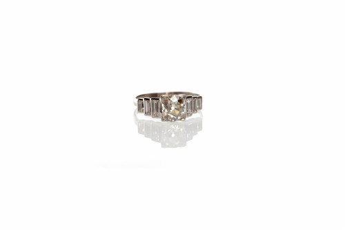 Lot 71 - ART DECO DIAMOND DRESS RING set with a central...