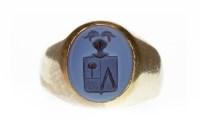 Lot 336 - GENTLEMAN'S SEAL RING set with an oval blue...