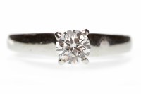 Lot 369 - DIAMOND SOLITAIRE RING set with a round...