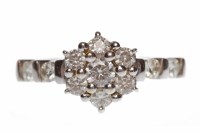 Lot 735 - EIGHTEEN CARAT GOLD DIAMOND CLUSTER RING with...