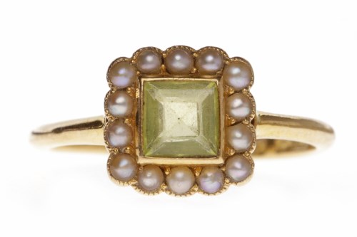 Lot 23 - EDWARDIAN PASTE AND PEARL DRESS RING set with...
