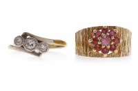 Lot 99 - TWO GOLD DRESS RINGS comprising one with a...
