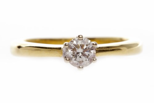 Lot 136 - DIAMOND SOLITAIRE RING set with a round...
