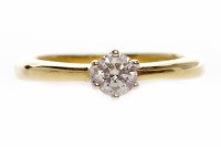 Lot 136 - DIAMOND SOLITAIRE RING set with a round...