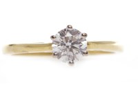 Lot 152 - DIAMOND SOLITAIRE RING set with a round...