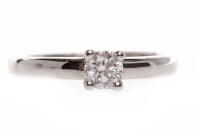 Lot 157 - PLATINUM DIAMOND SOLITAIRE RING set with a...