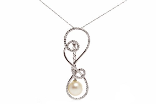 Lot 191 - EIGHTEEN CARAT WHITE GOLD PEARL AND DIAMOND...