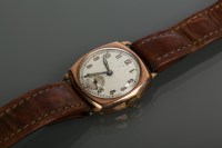 Lot 854 - GENTLEMAN'S NINE CARAT GOLD CUSHION CASED...