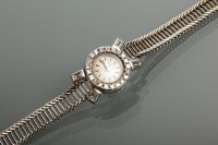 Lot 895 - LADY'S EIGHTEEN CARAT GOLD DIAMOND SET...