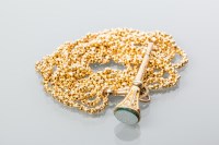 Lot 1896 - NINE CARAT GOLD GUARD CHAIN with a watch key...