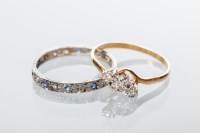 Lot 1908 - DIAMOND THREE STONE RING set with three small...