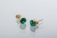 Lot 1920 - PAIR OF EMERALD STUD EARRINGS each set with a...