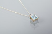 Lot 1925 - AQUAMARINE AND DIAMOND PENDANT the square cut...