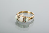 Lot 1938 - OPAL AND DIAMOND RING set with three oval...