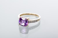 Lot 1978 - AMETHYST AND DIAMOND RING the cushion cut...