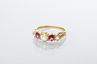 Lot 1988 - VICTORIAN RED AND YELLOW GEM SET RING set with...