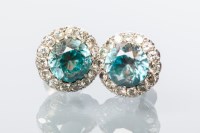 Lot 2002 - PAIR OF ZIRCON AND DIAMOND CLUSTER EARRINGS...
