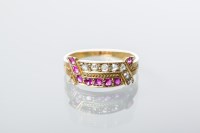 Lot 2023 - VICTORIAN RUBY AND DIAMOND RING with two...