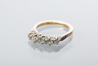 Lot 2031 - DIAMOND FIVE STONE RING the graduated...