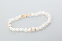 Lot 2037 - MIKIMOTO PEARL BRACELET with a single strand...