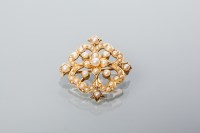 Lot 2042 - EDWARDIAN SEED PEARL BROOCH of pierced floral...