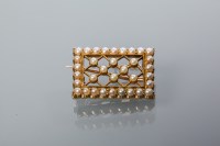 Lot 2043 - EDWARDIAN SEED PEARL SET BROOCH of pierced...